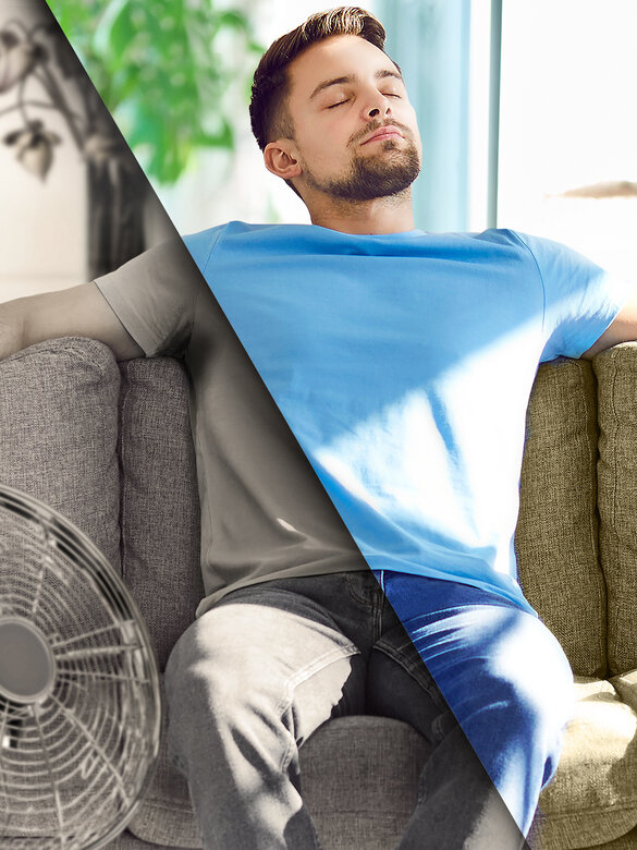 Young man relaxing on couch enjoying fresh air of comfortable indoor climate